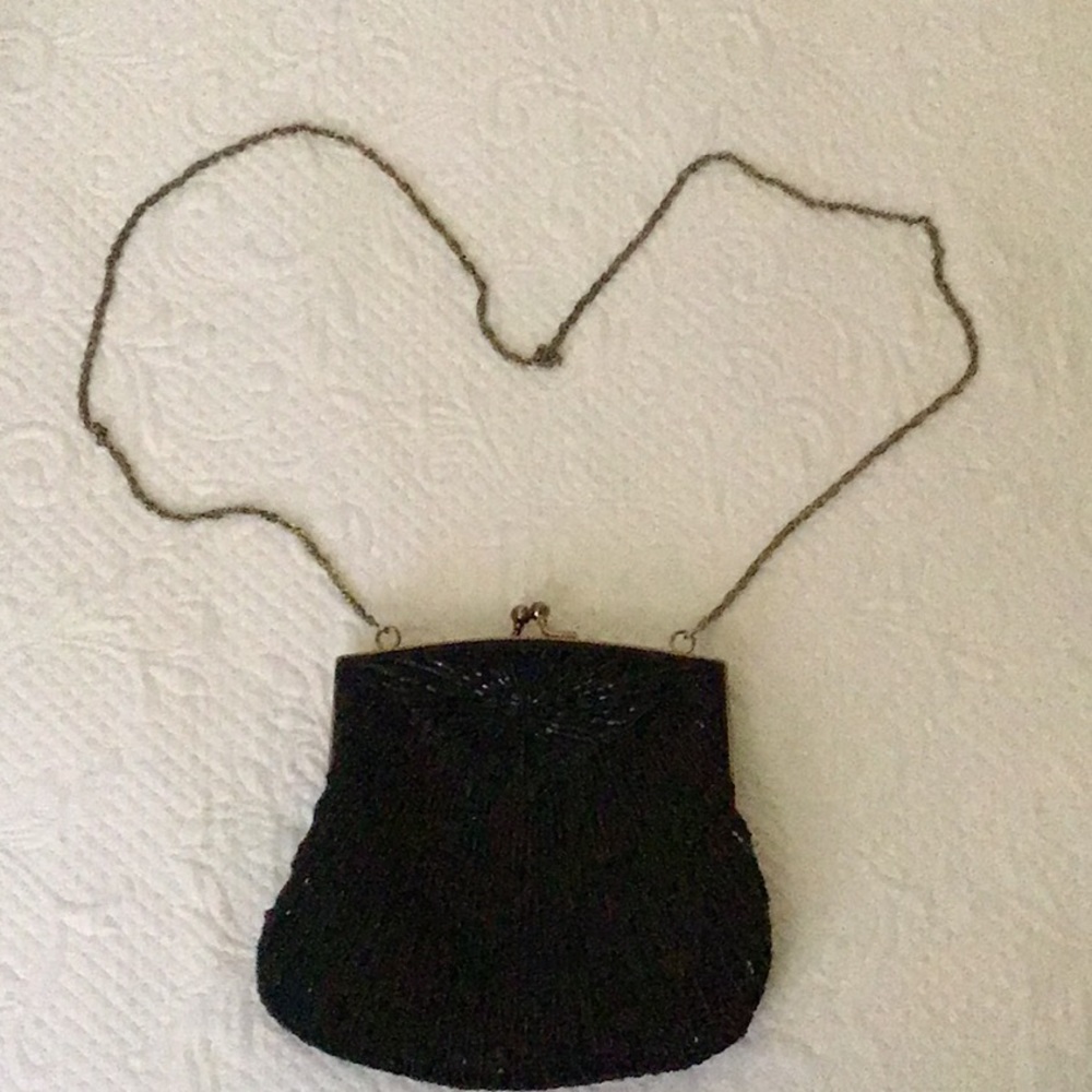Precious black beaded clutch with chain